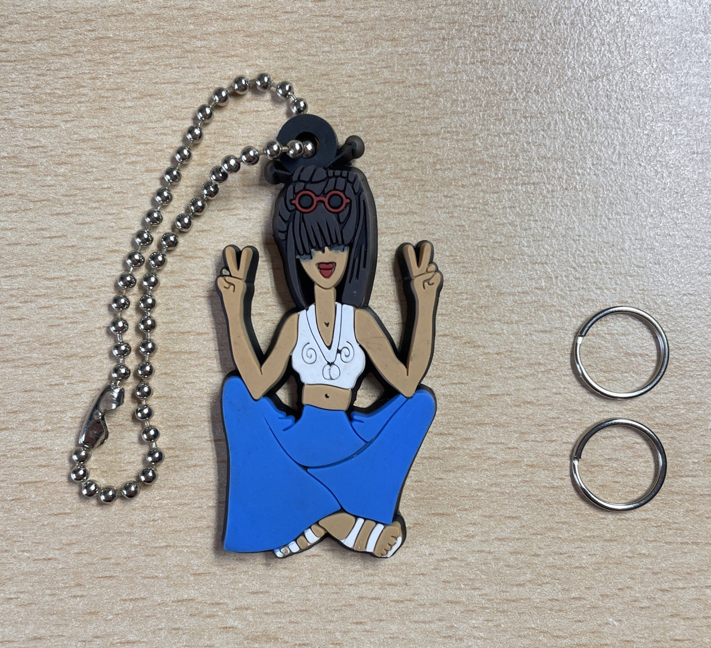 Keychain Charm Brunette girl sitting peace