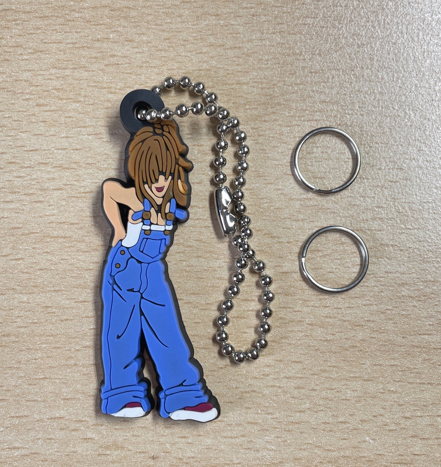 Keychain Charm girl wearing blue overalls