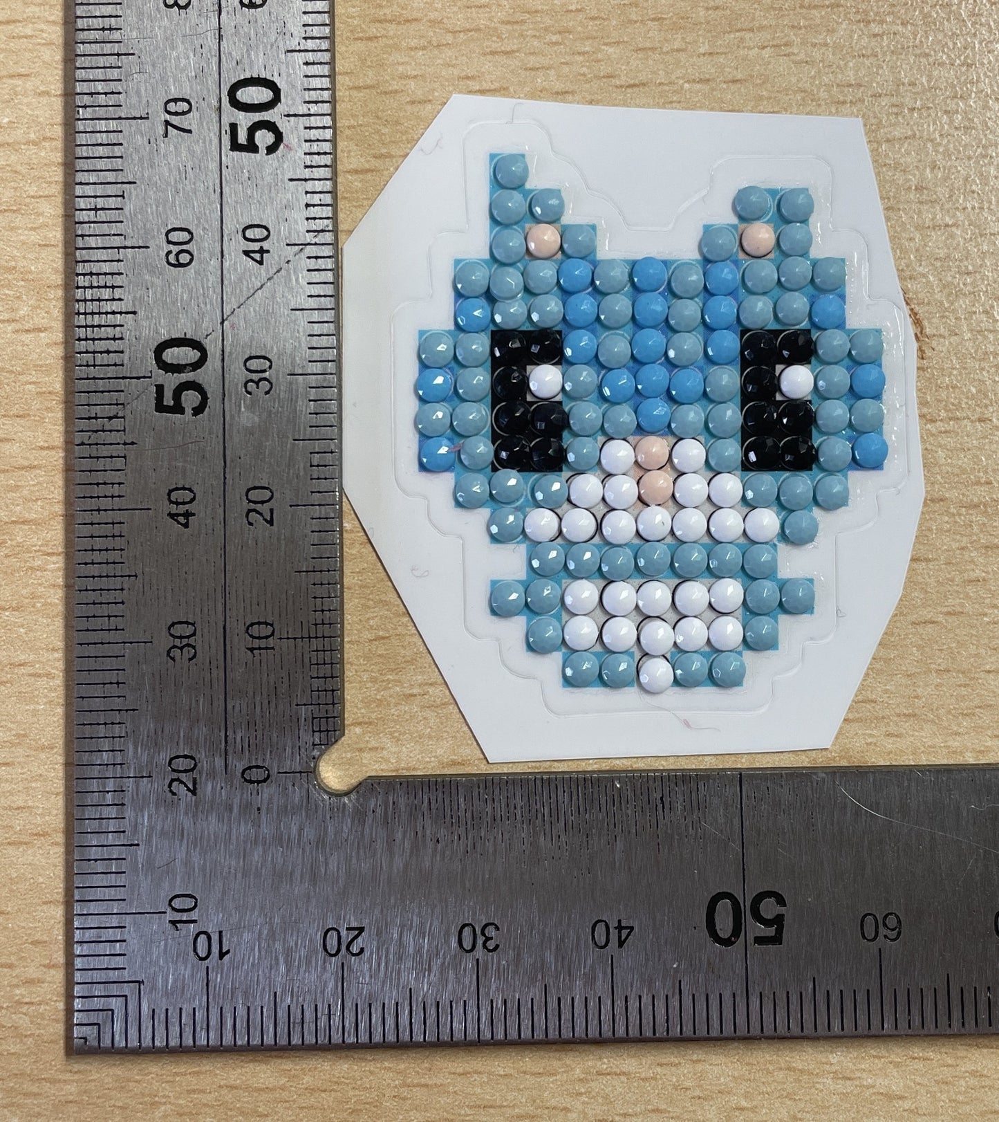 Cartoon-style face, likely a cat or similar animal Diamond Art Sticker