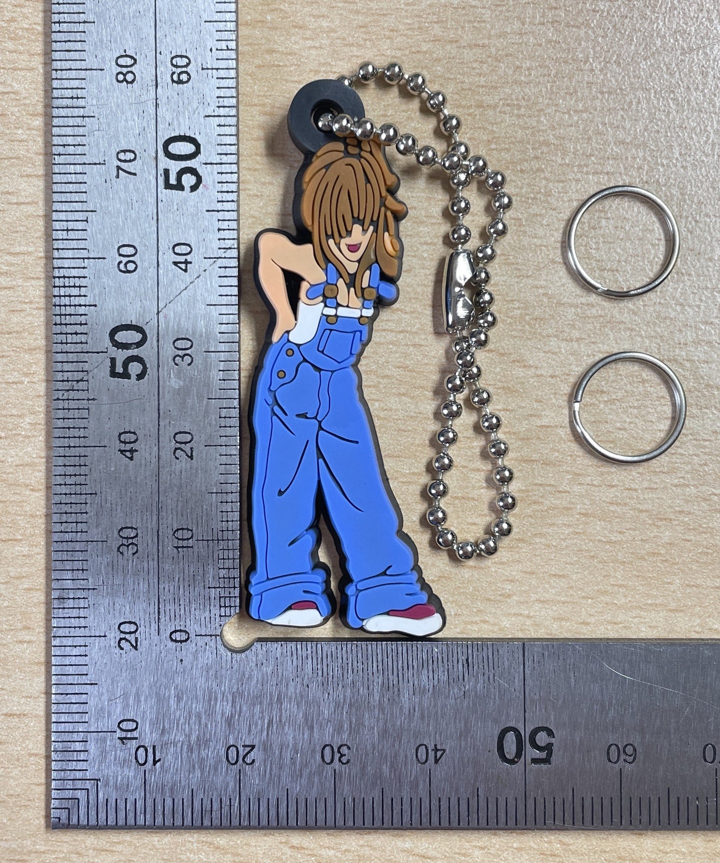 Keychain Charm girl wearing blue overalls