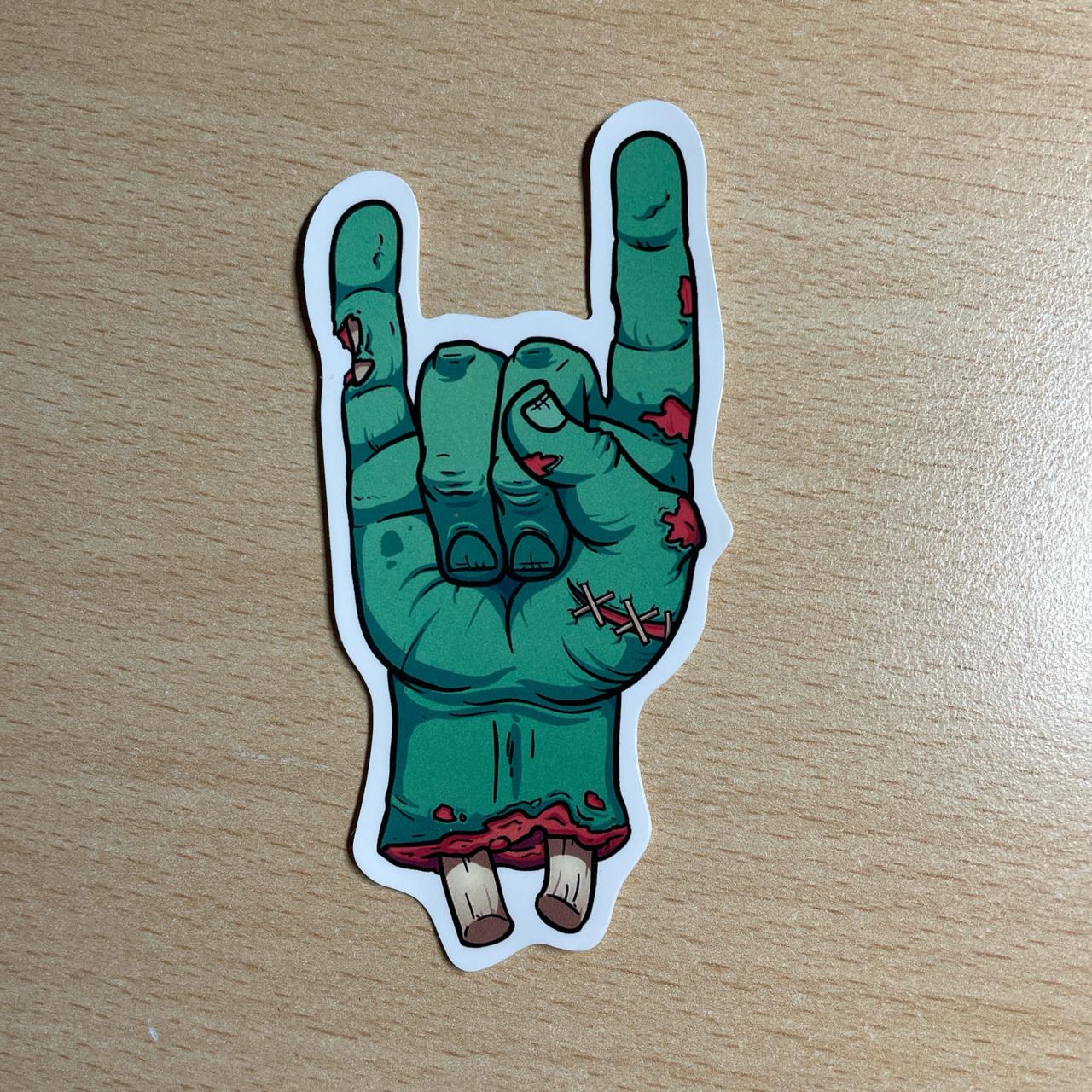 Sticker of a zombie hand with middle finger, #goth #emo
